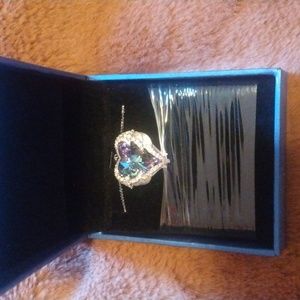 Silver Angel wings necklace. Blue stoneNew in box